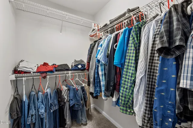 a view of balcony with wooden floor and outdoor seating
