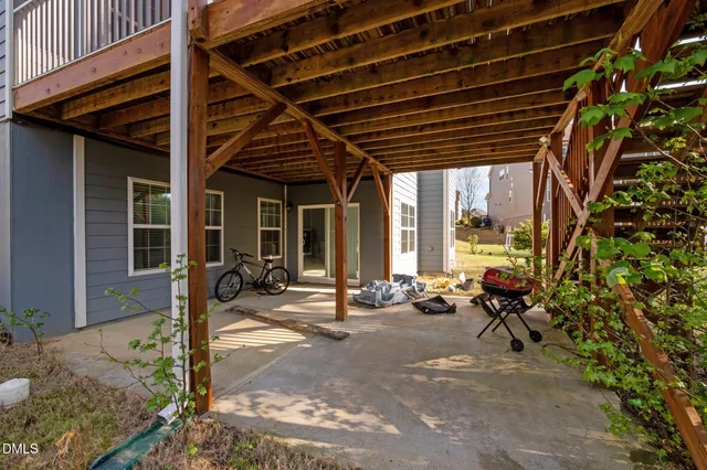 an aerial view of a house with a garden