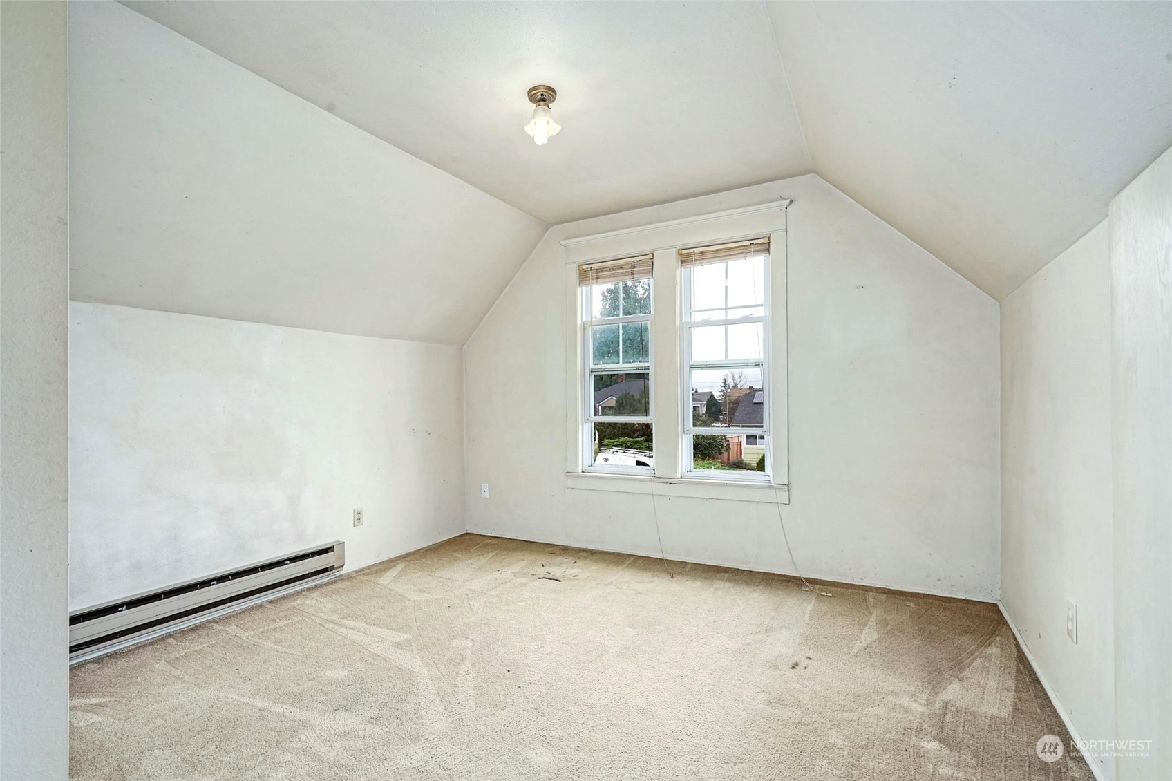 6344 37th Avenue Southwest Seattle, WA 98126 - Photo 11 of 20 an empty room with a window