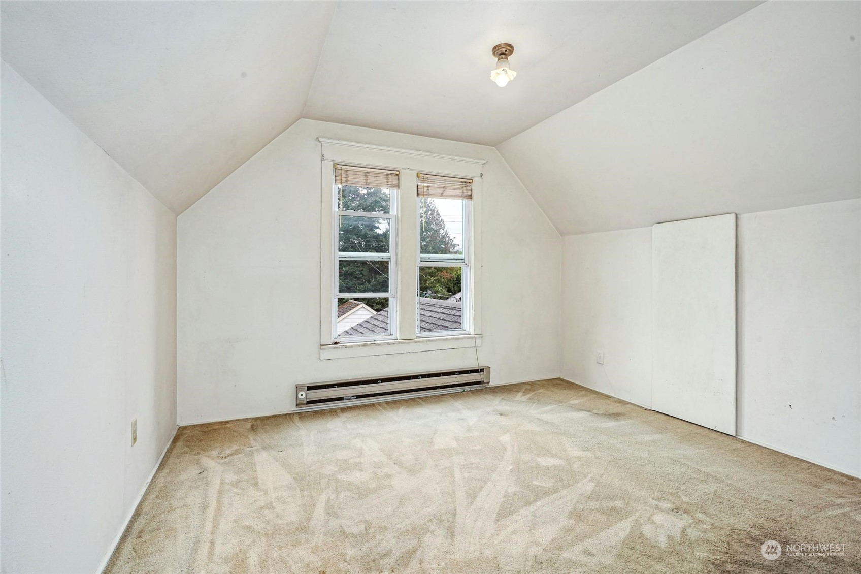 6344 37th Avenue Southwest Seattle, WA 98126 - Photo 12 of 20 an empty room with windows