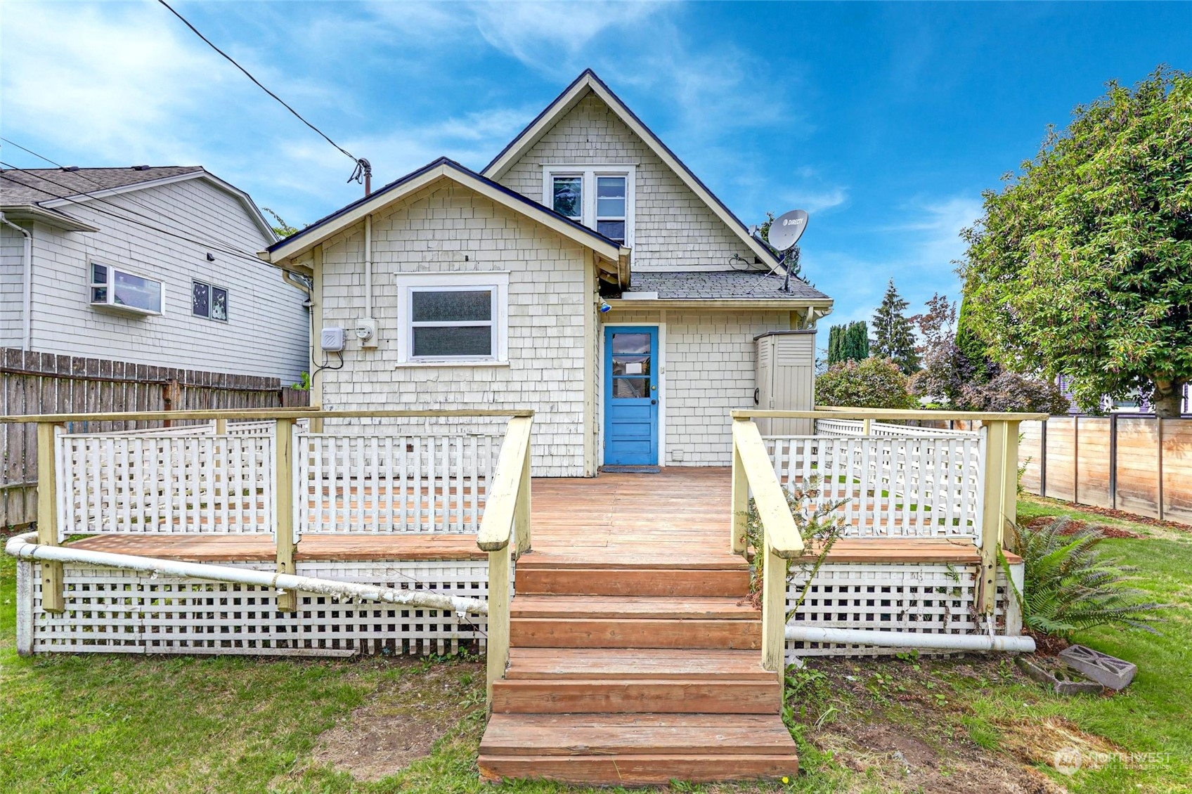 6344 37th Avenue Southwest Seattle, WA 98126 - Photo 13 of 20 a view of a house with a fence