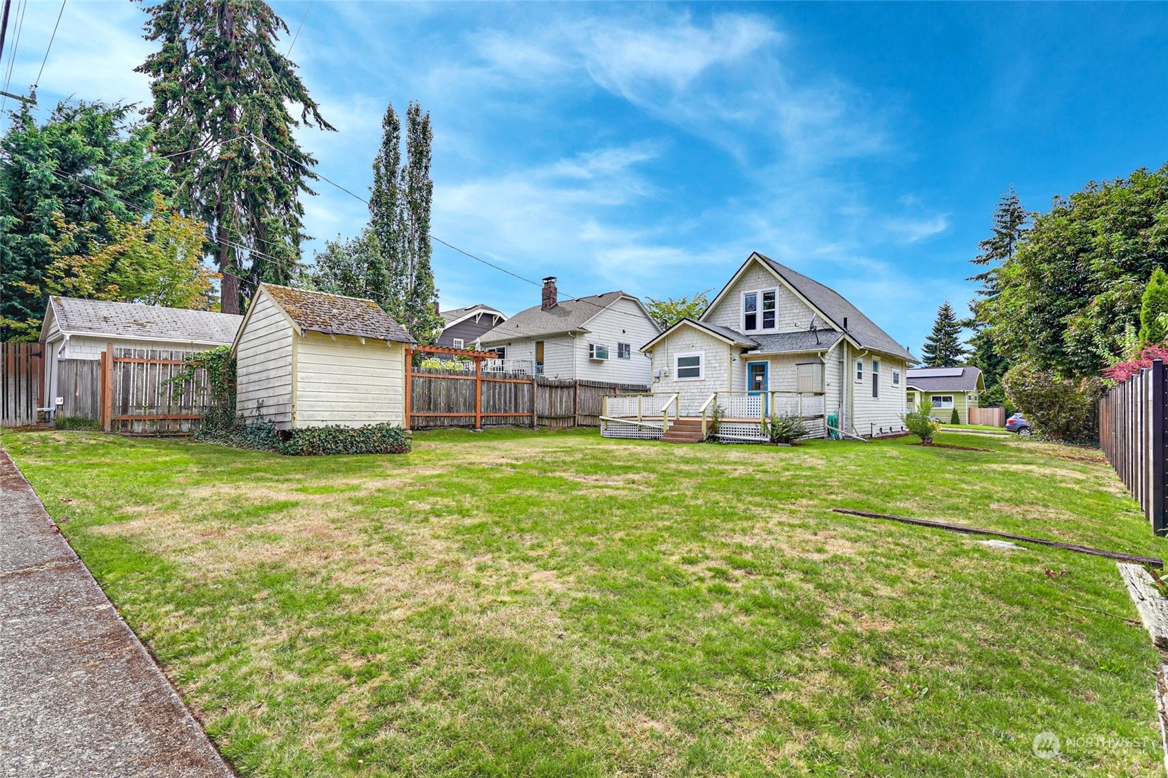 6344 37th Avenue Southwest Seattle, WA 98126 - Photo 14 of 20 a view of a house with backyard and garden