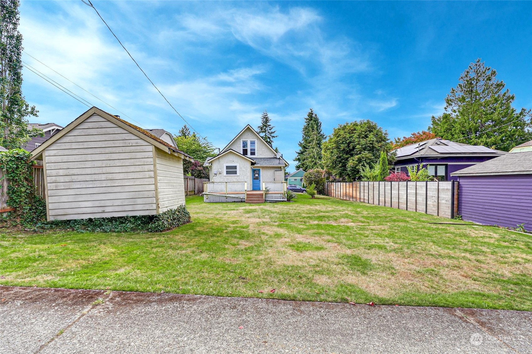 6344 37th Avenue Southwest Seattle, WA 98126 - Photo 15 of 20 a view of a house with backyard and garden