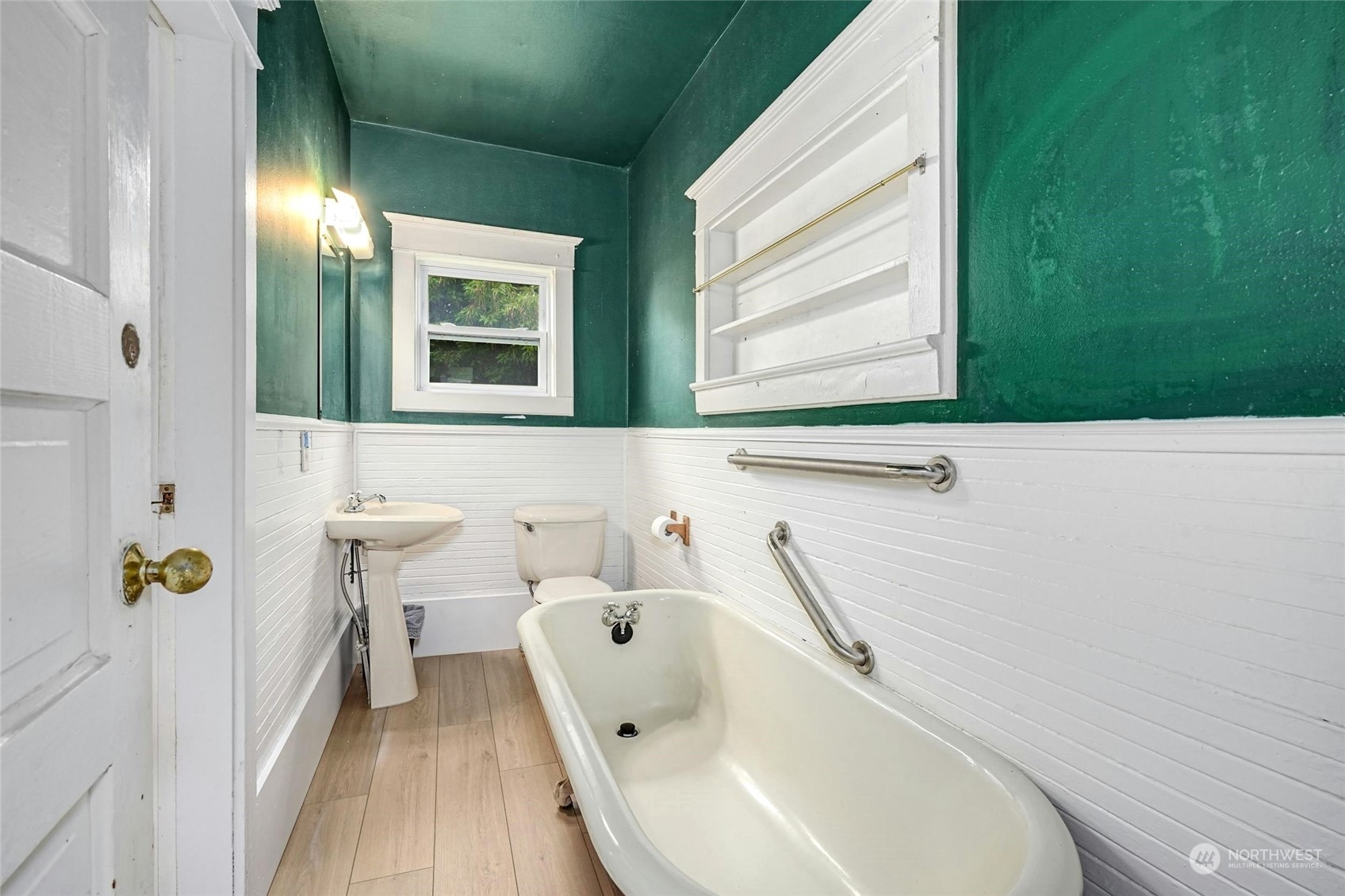 6344 37th Avenue Southwest Seattle, WA 98126 - Photo 10 of 20 a bathroom with a sink and a bathtub