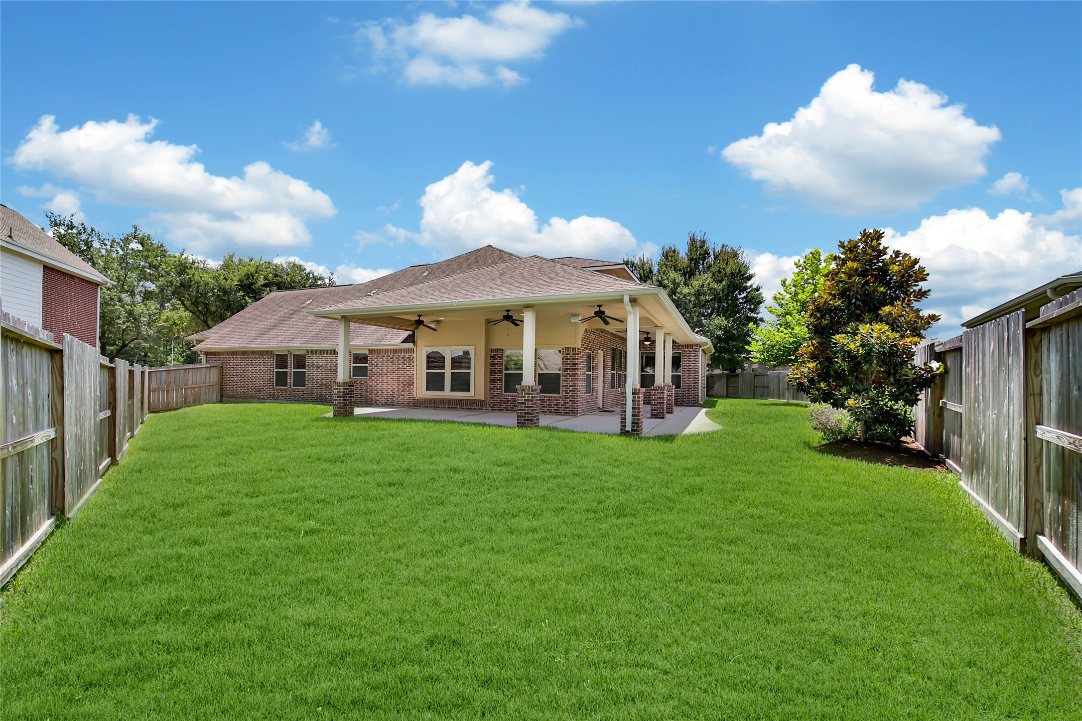 1215 Jake Springs Court Spring, TX 77386 - Photo 34 of 49 The backyard offers plenty of space for outdoor play with two spacious side yards thanks to the cul-de-sac location.