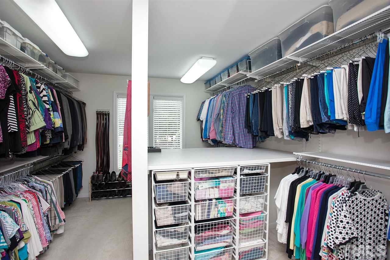 201 Release Circle Raleigh, NC 27615 - Photo 14 of 25 Your master walk-in is larger than some bedrooms and includes shelving and organizers.