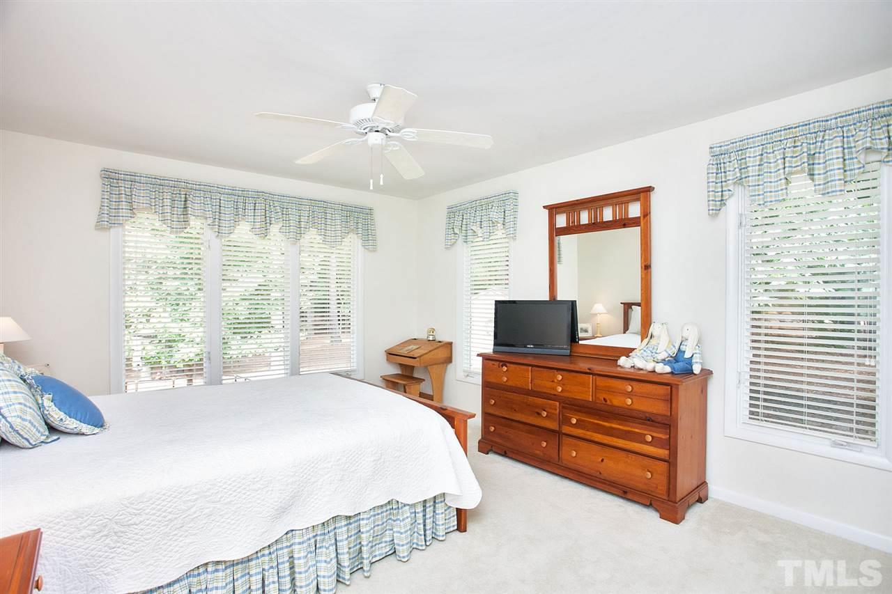 201 Release Circle Raleigh, NC 27615 - Photo 16 of 25 This spacious bedroom features lots of natural light, large closet and a beautiful view.