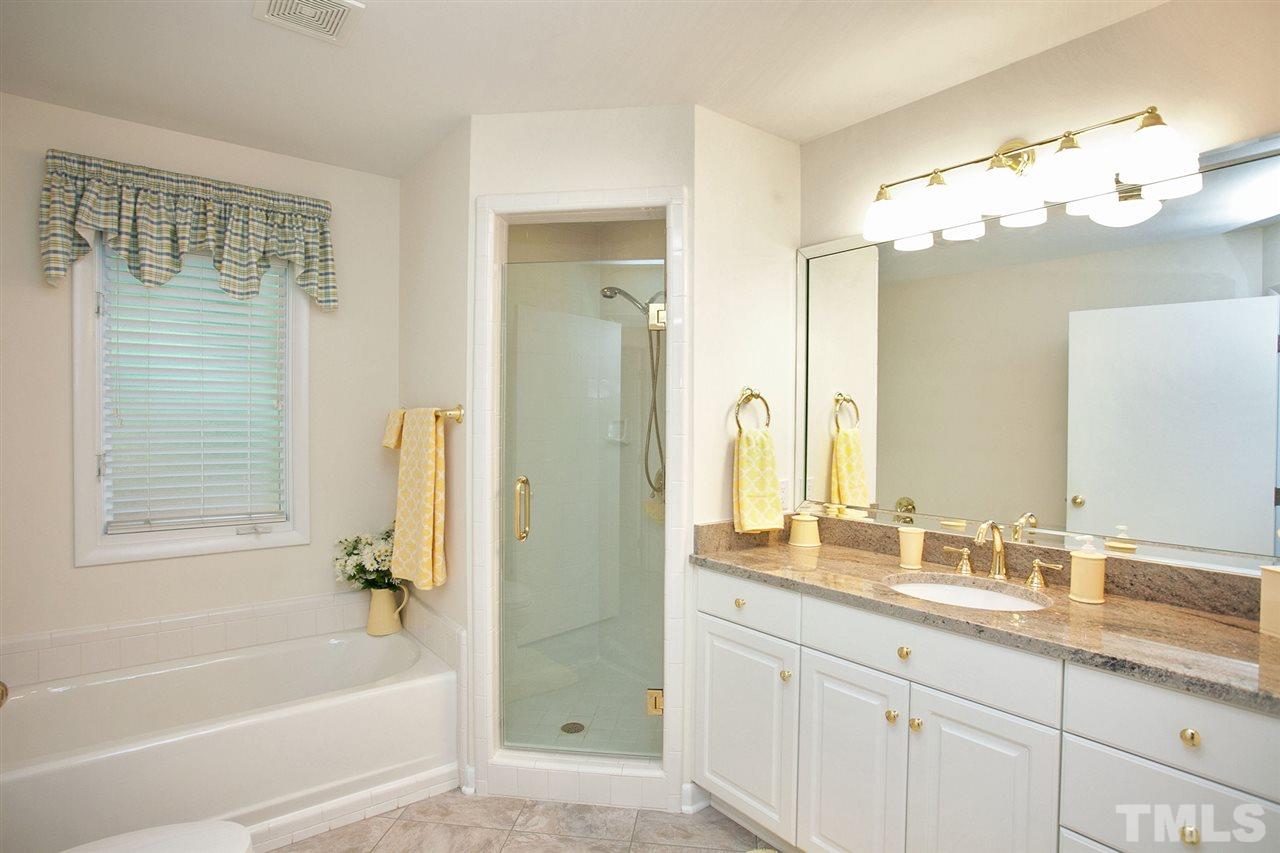 201 Release Circle Raleigh, NC 27615 - Photo 17 of 25 The hall bath features a Solatube "skylight" feature that fills this room with sunlight every day.