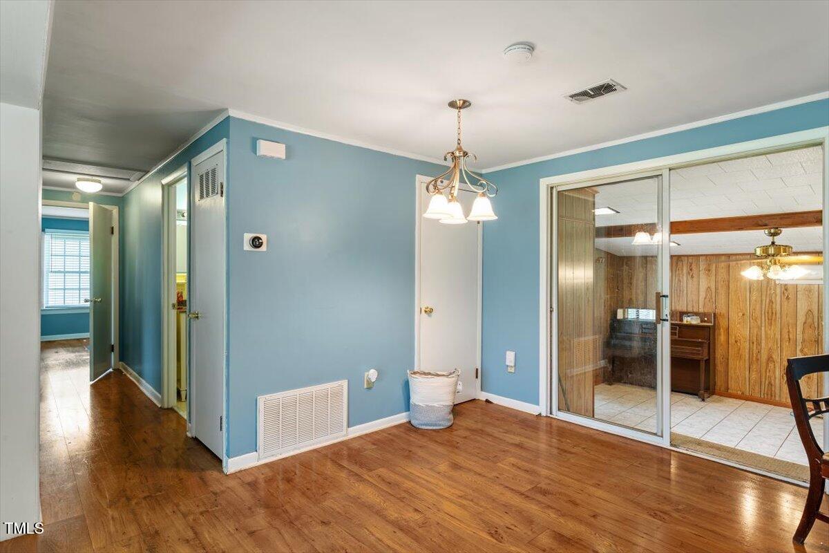 65 Pine View Road Henderson, NC 27537 - Photo 10 of 43 a view of livingroom with furniture wooden floor and window