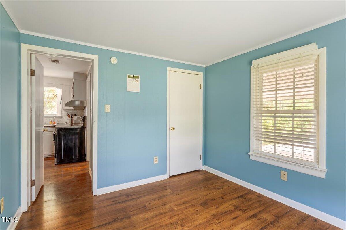 65 Pine View Road Henderson, NC 27537 - Photo 16 of 43 a view of a room with wooden floor cabinet and a bathroom