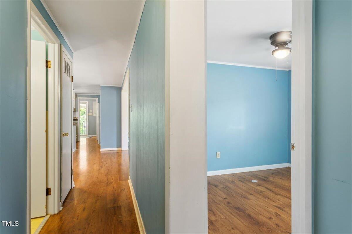 65 Pine View Road Henderson, NC 27537 - Photo 23 of 43 a view of a hallway with wooden floor