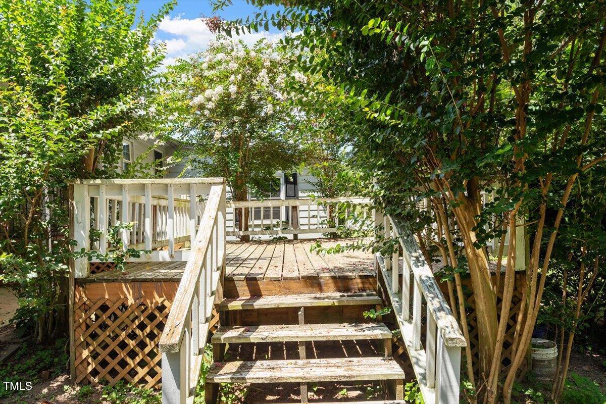65 Pine View Road Henderson, NC 27537 - Photo 27 of 43 front view of house with large trees