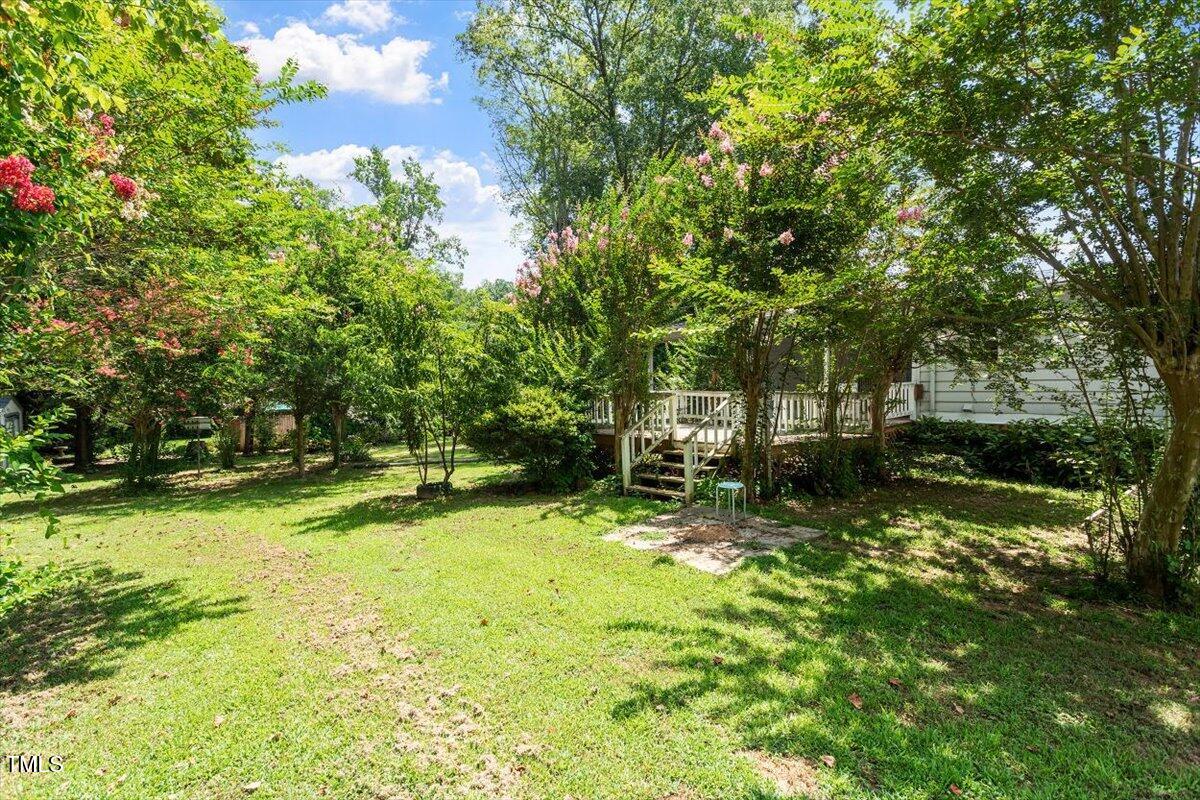 65 Pine View Road Henderson, NC 27537 - Photo 29 of 43 a view of backyard with swimming pool