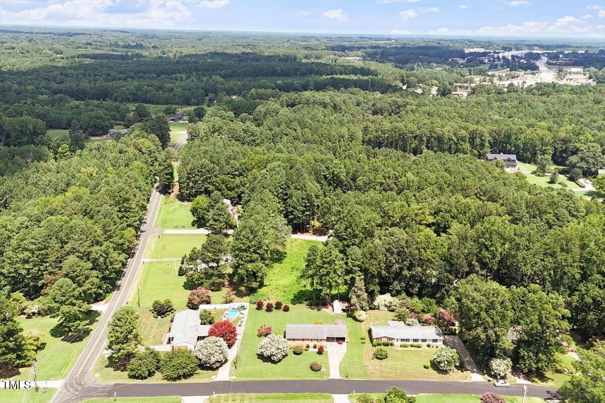 65 Pine View Road Henderson, NC 27537 - Photo 40 of 43 a view of a lake with a mountain in the background