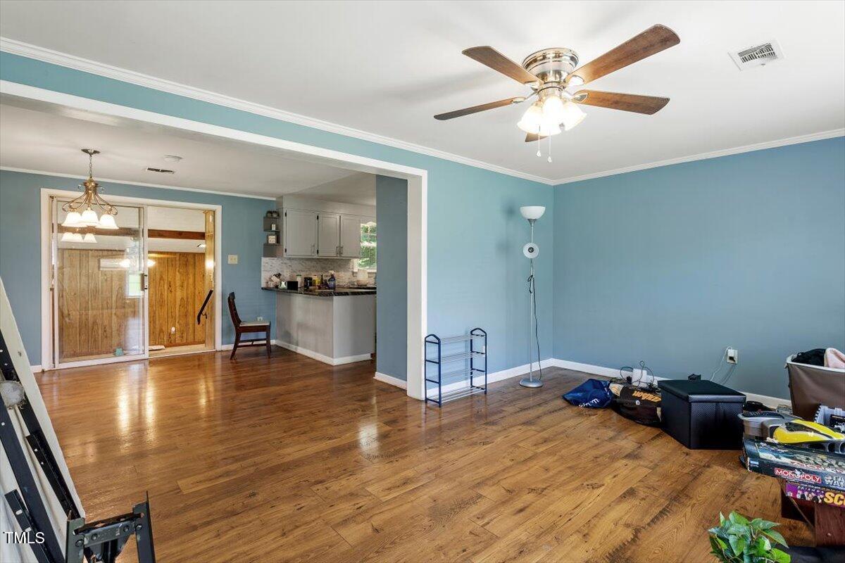 65 Pine View Road Henderson, NC 27537 - Photo 6 of 43 a room with a bed and furniture