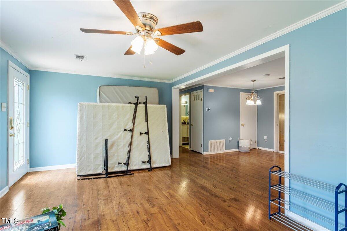 65 Pine View Road Henderson, NC 27537 - Photo 8 of 43 a view of a livingroom with wooden floor