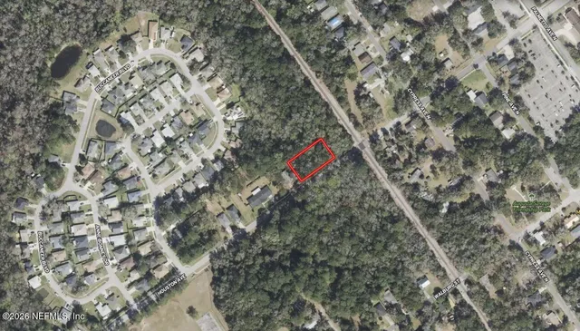 a view of staircase with white walls