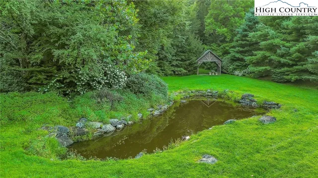 a view of a golf course with a lake