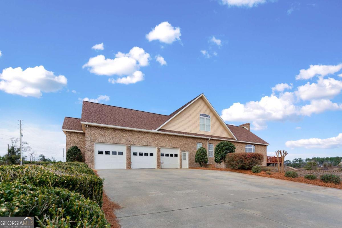 42 Claxton Road Hazlehurst, GA 31539 - Photo 18 of 73 a view of a house with a yard