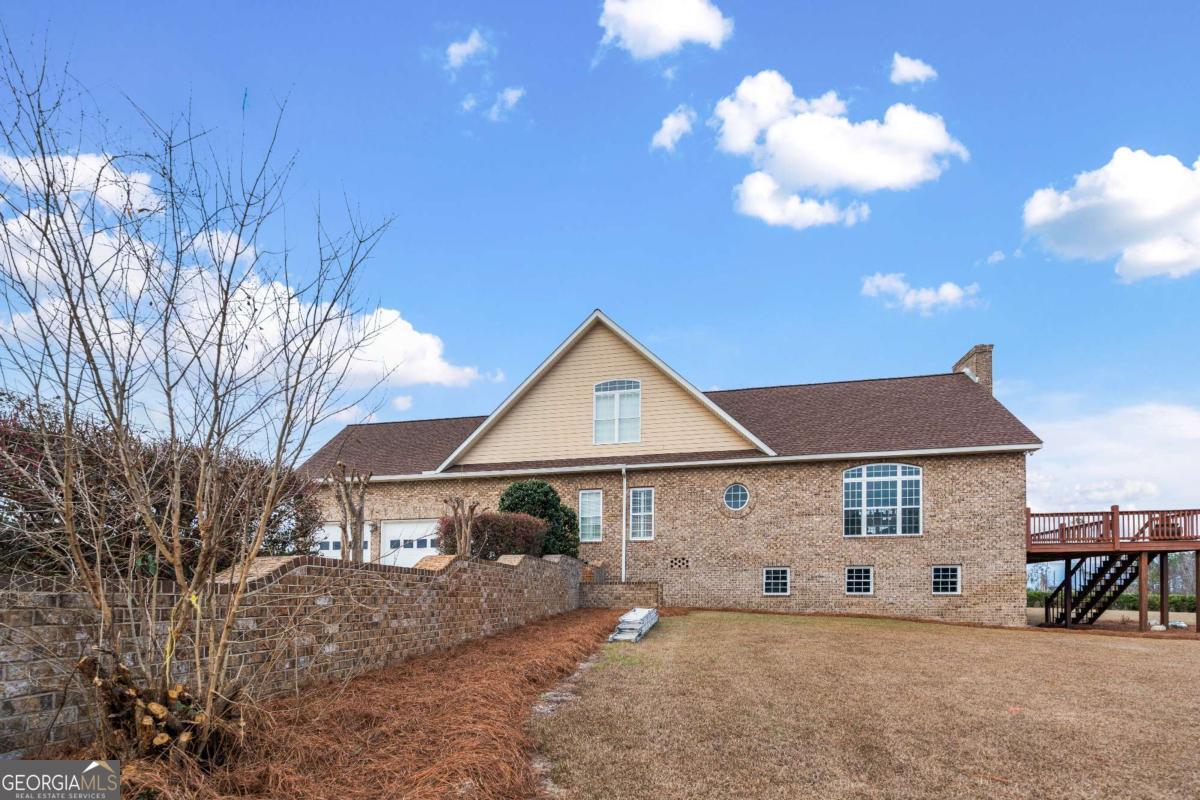 42 Claxton Road Hazlehurst, GA 31539 - Photo 19 of 73 a view of a house with a yard