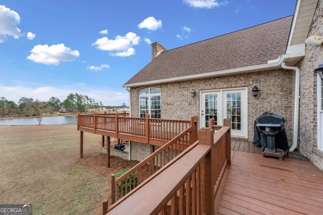 a living room with furniture fireplace and flat screen tv