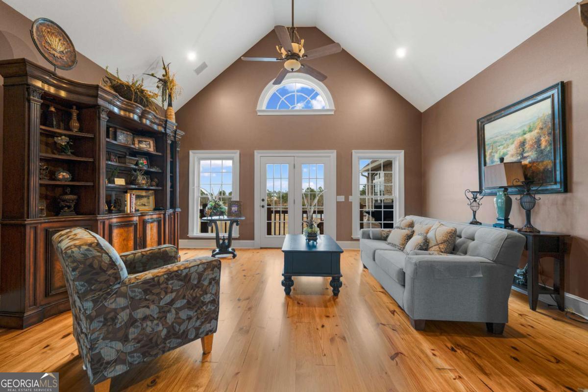 42 Claxton Road Hazlehurst, GA 31539 - Photo 37 of 73 a living room with furniture and a hard wood floor
