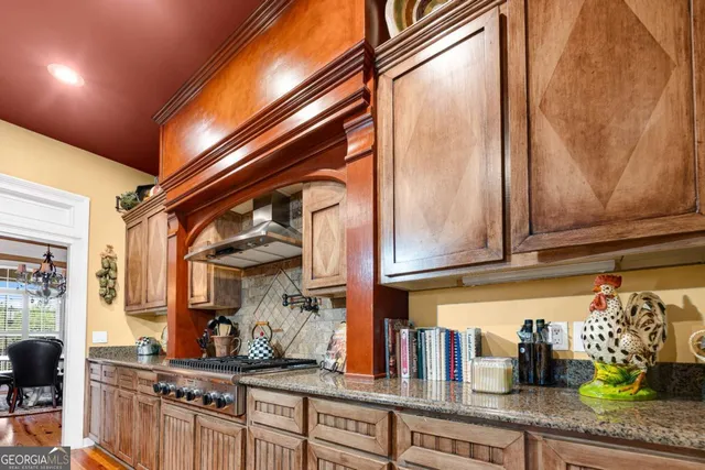 a white toilet sitting next to a white wall