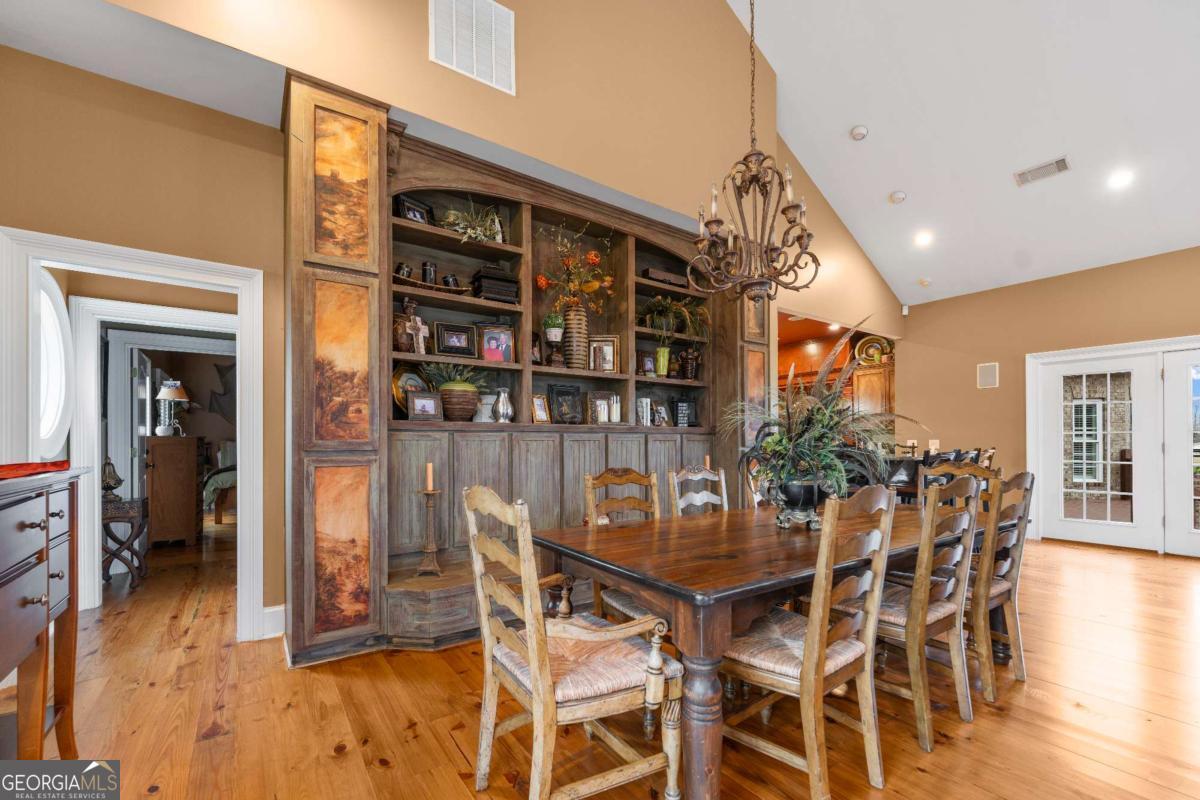 42 Claxton Road Hazlehurst, GA 31539 - Photo 47 of 73 a dining room with furniture and wooden floor