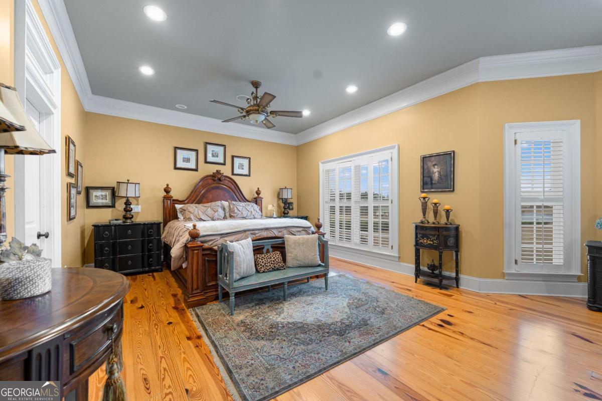 42 Claxton Road Hazlehurst, GA 31539 - Photo 57 of 73 a bedroom with a bed and a dresser