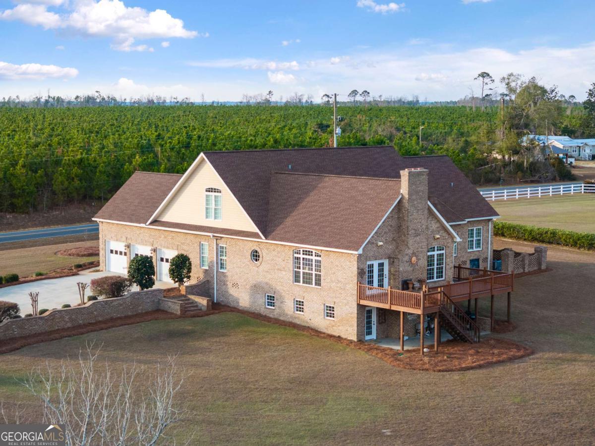 42 Claxton Road Hazlehurst, GA 31539 - Photo 6 of 73 an aerial view of a house with porch