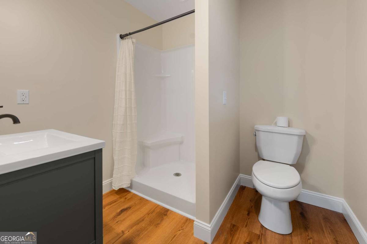 42 Claxton Road Hazlehurst, GA 31539 - Photo 66 of 73 a bathroom with a toilet and a sink