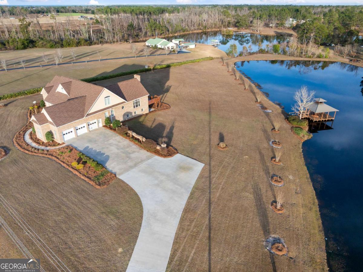 42 Claxton Road Hazlehurst, GA 31539 - Photo 7 of 73 an aerial view of a house with outdoor space