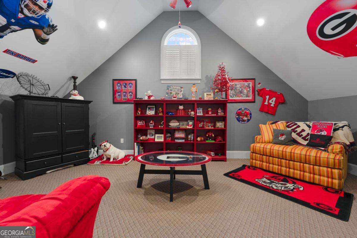 42 Claxton Road Hazlehurst, GA 31539 - Photo 72 of 73 a living room with baby crib furniture and a window