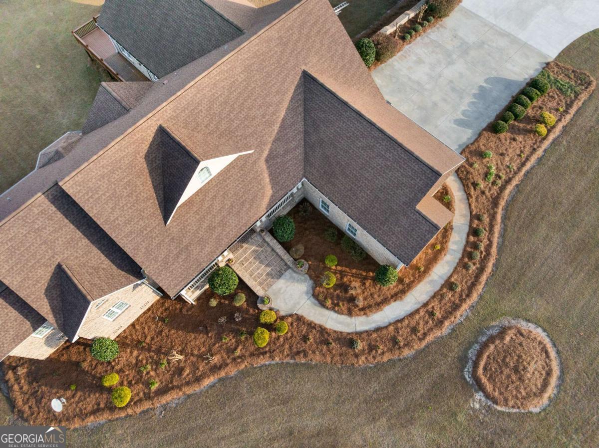 42 Claxton Road Hazlehurst, GA 31539 - Photo 9 of 73 an aerial view of a house with a swimming pool