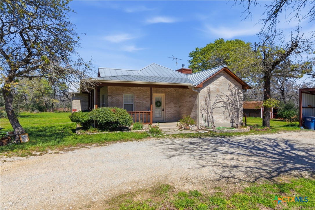 155 Guadalupe Ranch Lane Seguin, TX 78155 - Photo 11 of 48 a front view of a house with a yard and garage