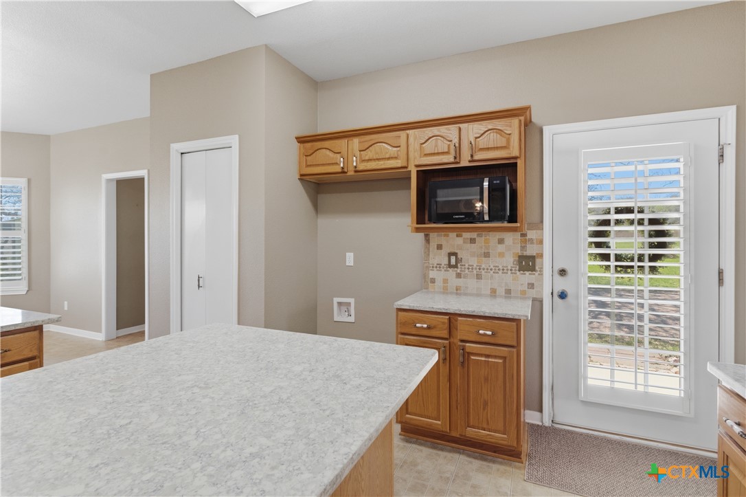 155 Guadalupe Ranch Lane Seguin, TX 78155 - Photo 24 of 48 a living room with fireplace furniture and a flat screen tv