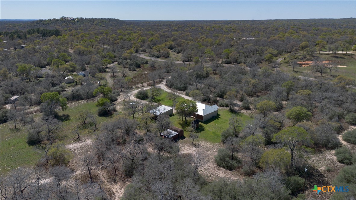 155 Guadalupe Ranch Lane Seguin, TX 78155 - Photo 46 of 48 a view of a forest with a street