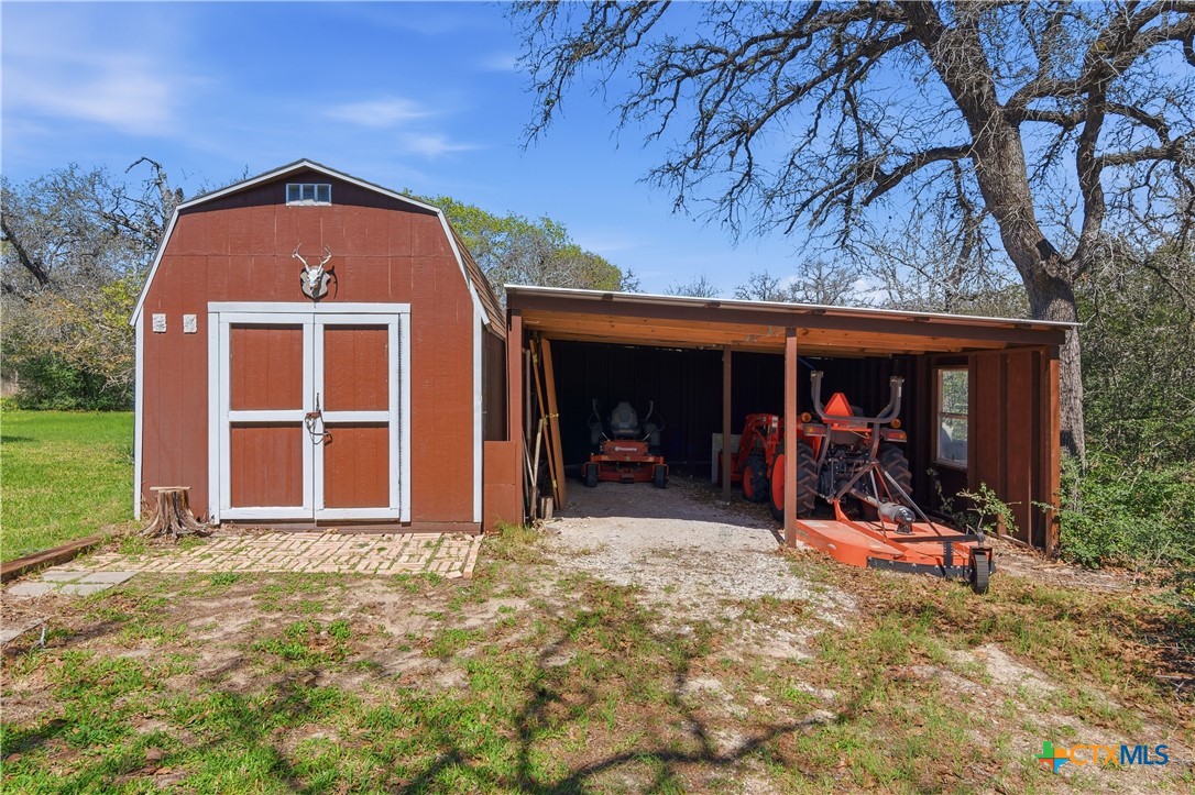 155 Guadalupe Ranch Lane Seguin, TX 78155 - Photo 10 of 48 a view of a house with a small yard and large tree