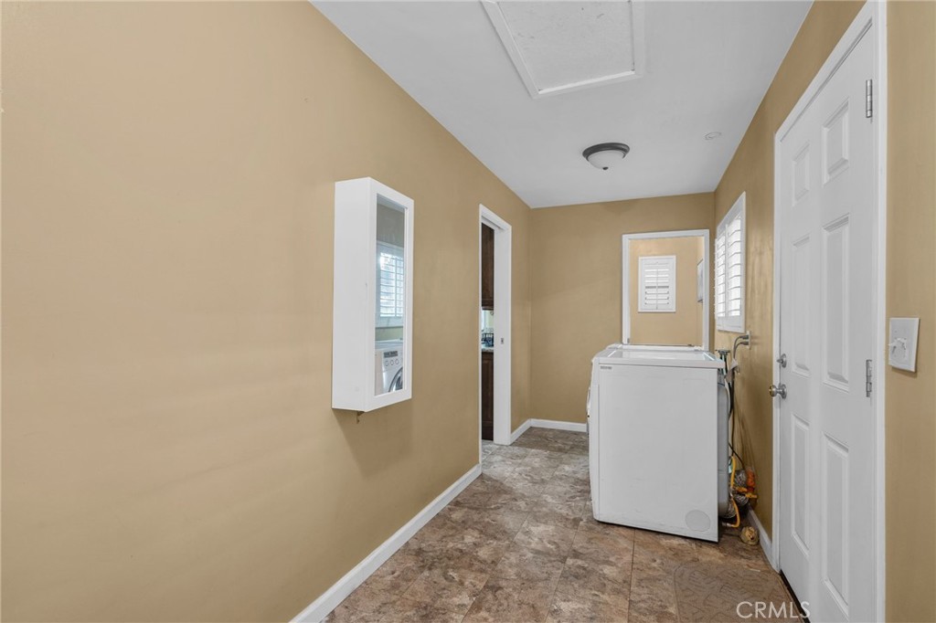 7247 Linden Lane Rancho Cucamonga, CA 91784 - Photo 17 of 51 a view of a hallway with front door