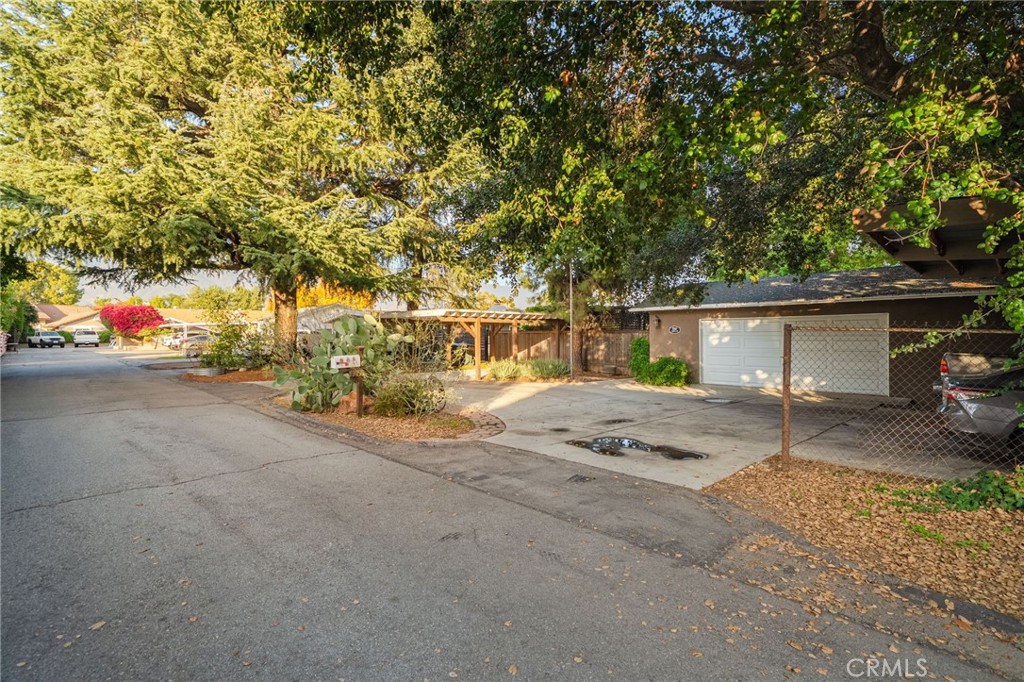 7247 Linden Lane Rancho Cucamonga, CA 91784 - Photo 26 of 51 front view of a house with a street