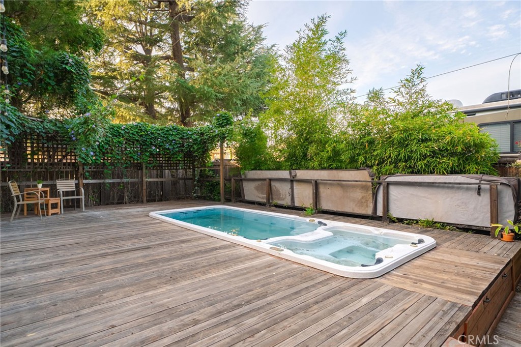 7247 Linden Lane Rancho Cucamonga, CA 91784 - Photo 29 of 51 a view of a backyard with wooden floor