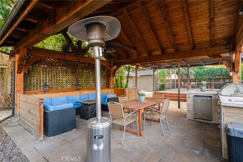 7247 Linden Lane Rancho Cucamonga, CA 91784 - Photo 32 of 51 a view of a chairs and table in the patio
