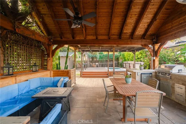 a view of yard with patio