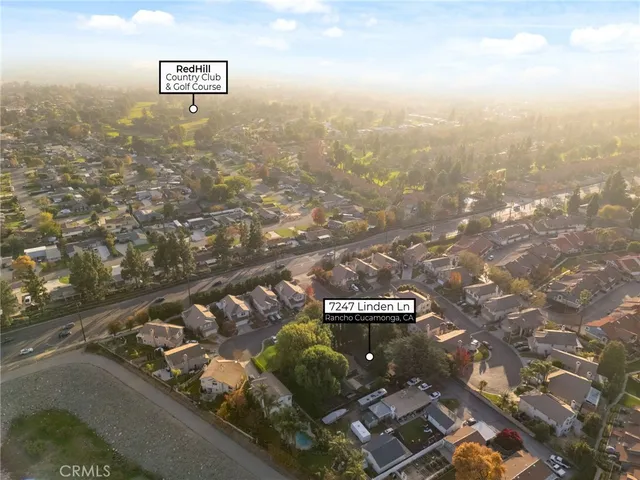 a view of a city with mountains in the background