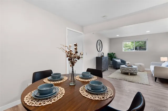 a kitchen with a table and chairs in it