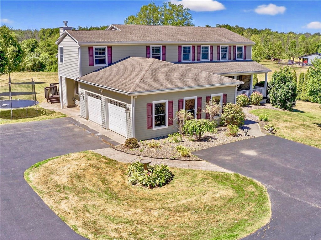 7169 Bear Swamp Road Williamson, NY 14589 - Photo 1 of 1 Great curb appeal, circular driveway