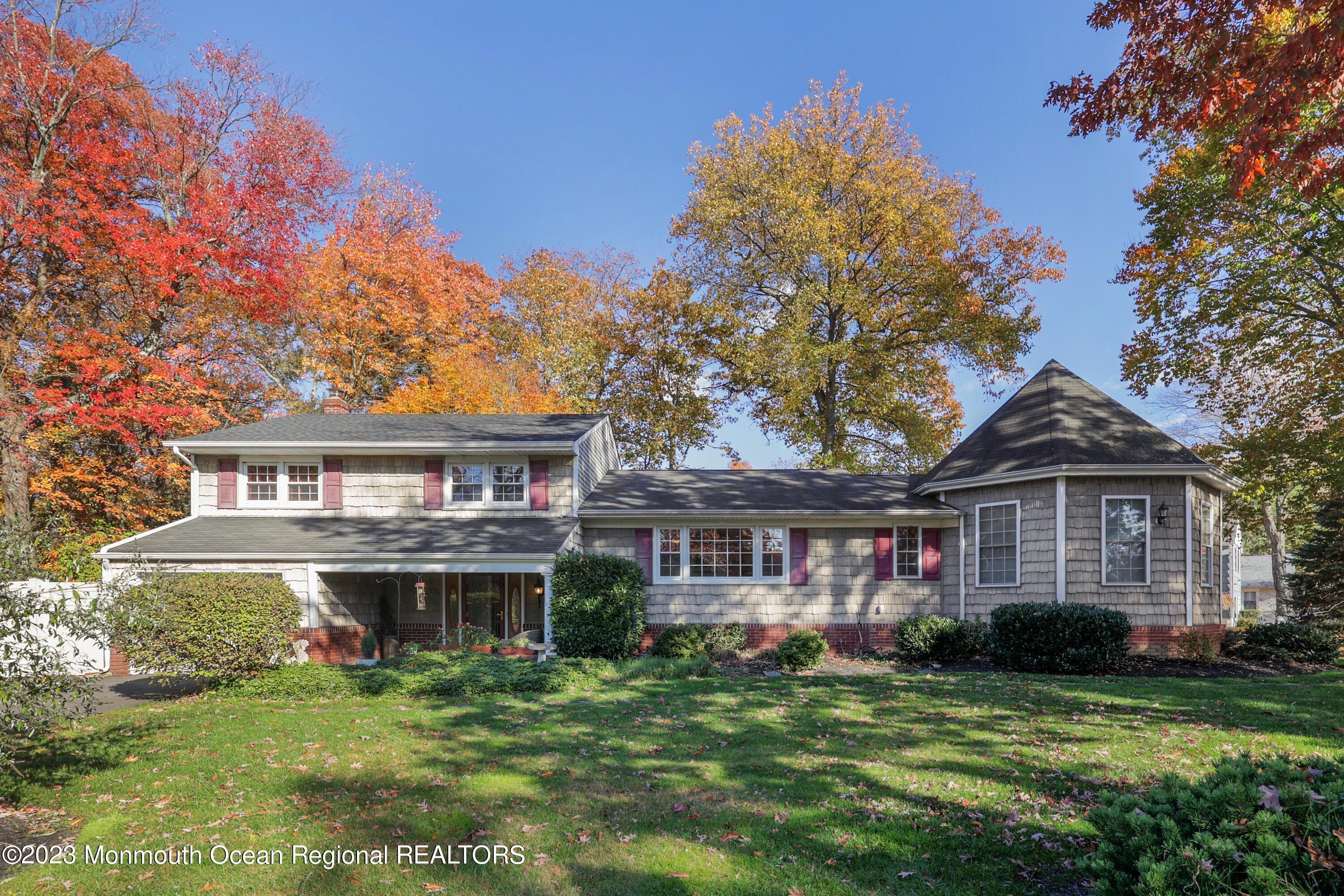 2600 Logan Road Asbury Park, NJ 07712 - Photo 1 of 36 a front view of a house with a garden