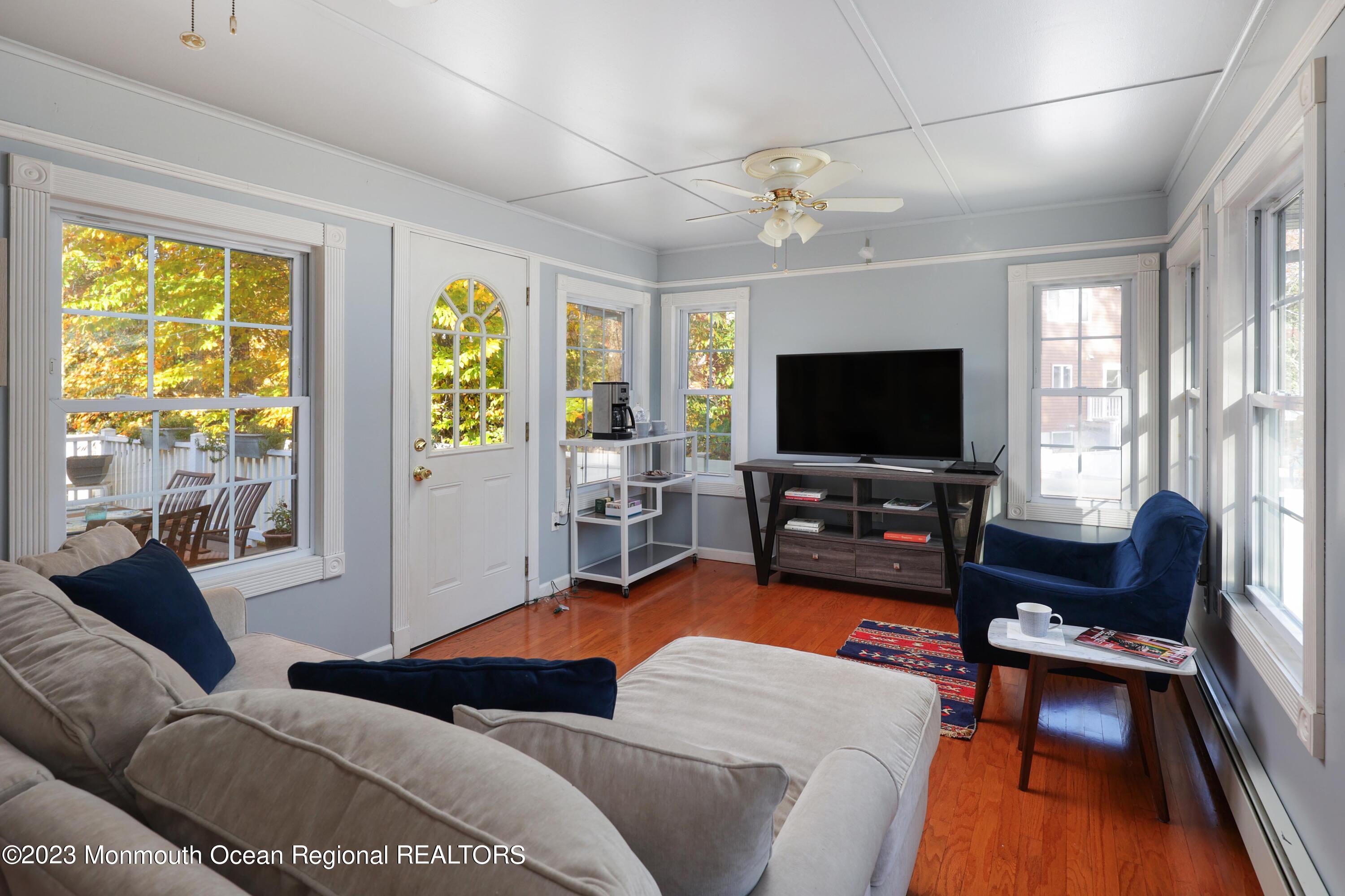 2600 Logan Road Asbury Park, NJ 07712 - Photo 12 of 36 a living room with furniture and a flat screen tv