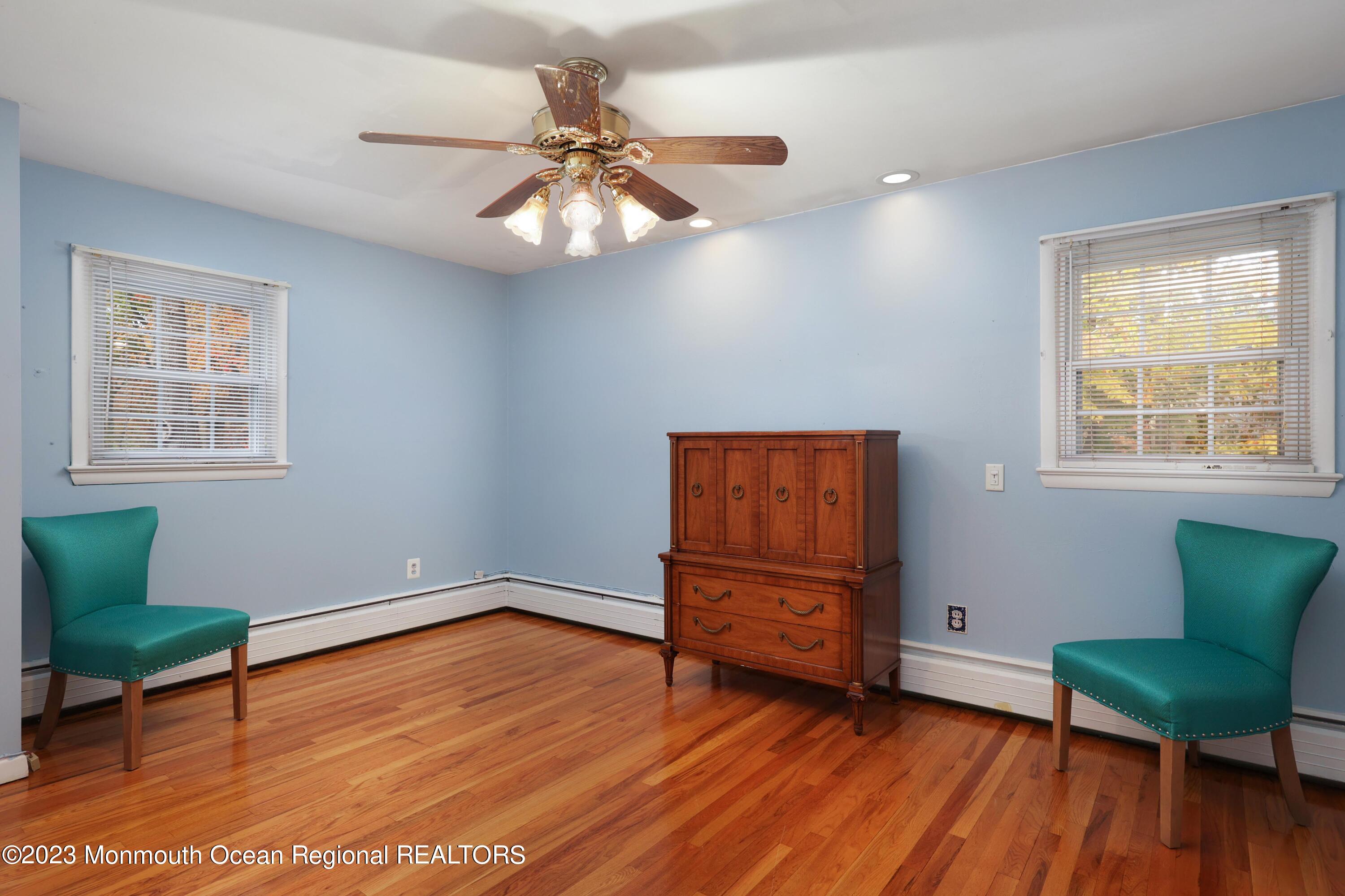 2600 Logan Road Asbury Park, NJ 07712 - Photo 22 of 36 a view of a livingroom with furniture and wooden floor