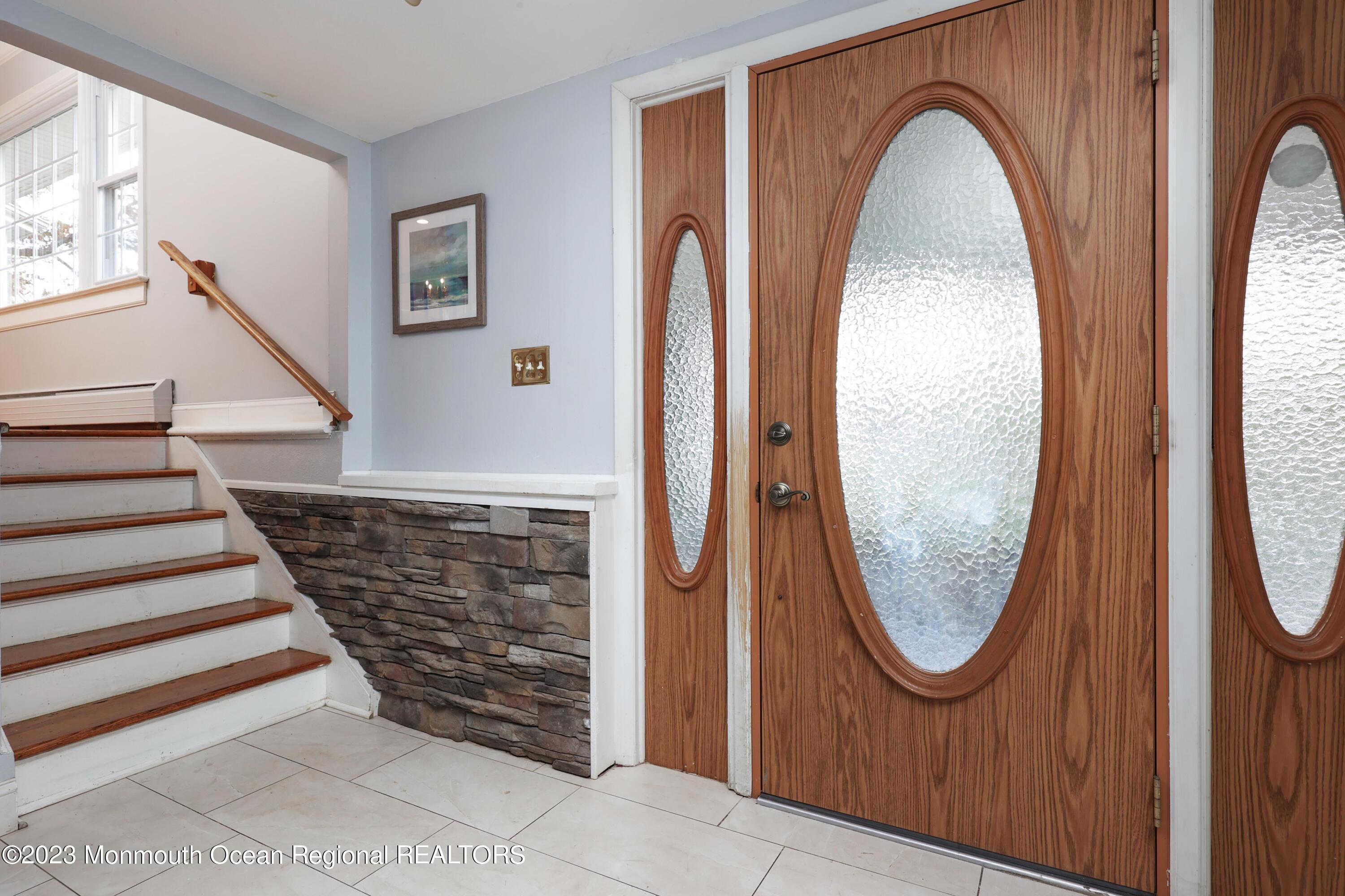 2600 Logan Road Asbury Park, NJ 07712 - Photo 5 of 36 a view of a entryway with wooden floor